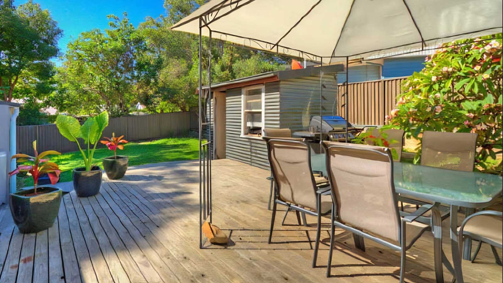 Bateau Bay outdoor deck before the safety and garden improvements