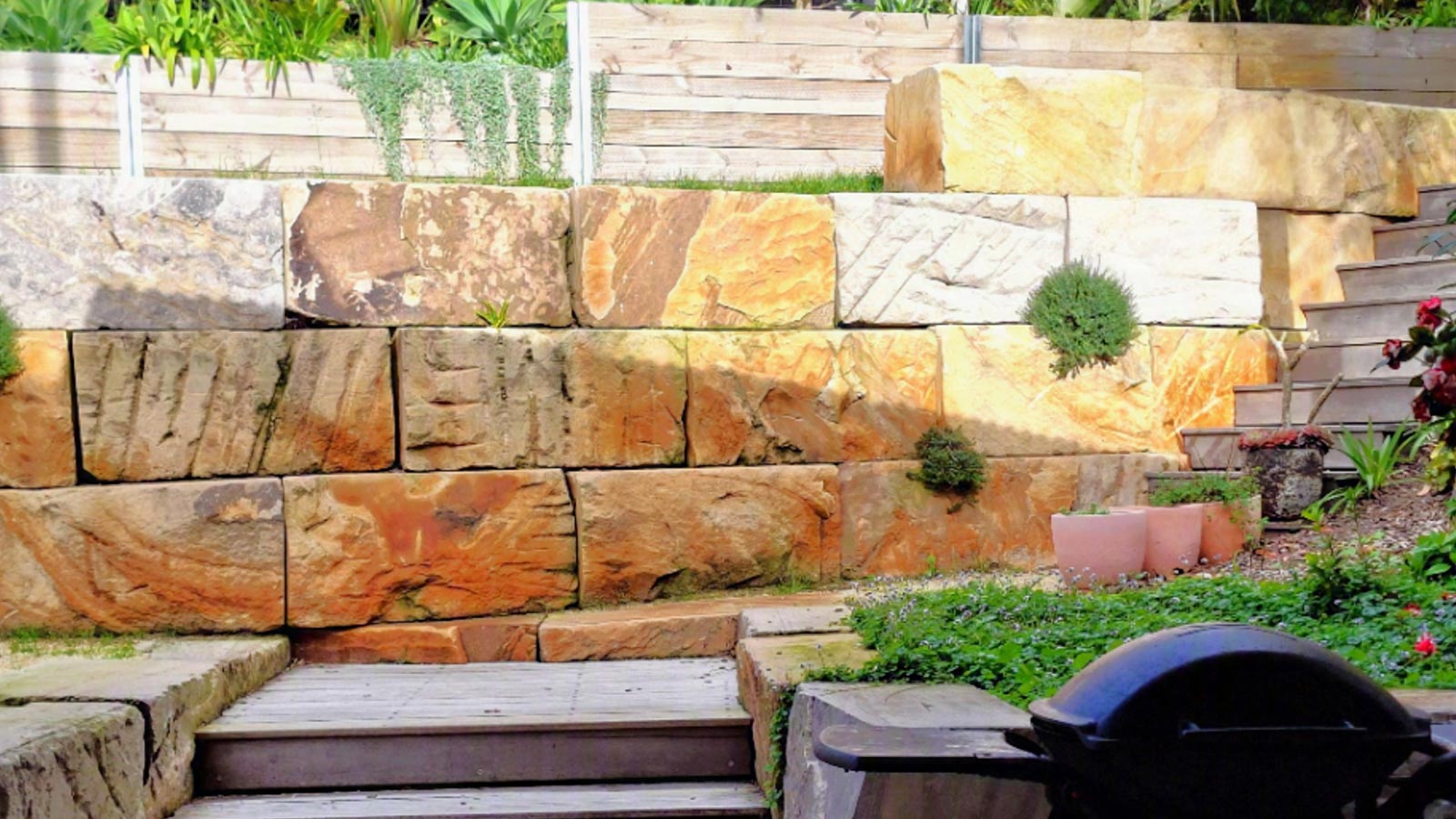 Fingal Bay rear garden after the sandstone retaining walls and new stairs were constructed