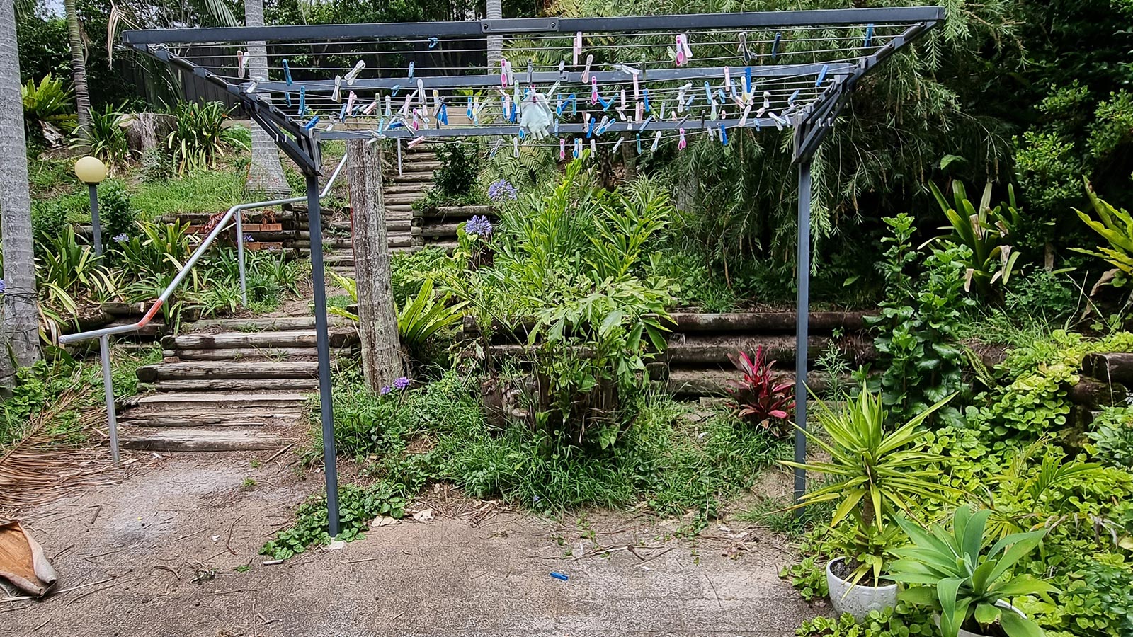 Fingal Bay rear garden before the ageing timber stairs and terraces were replaced