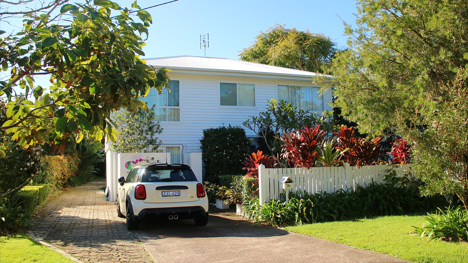 Little Beach property after the tropical garden, screening and welcoming entrance were completed