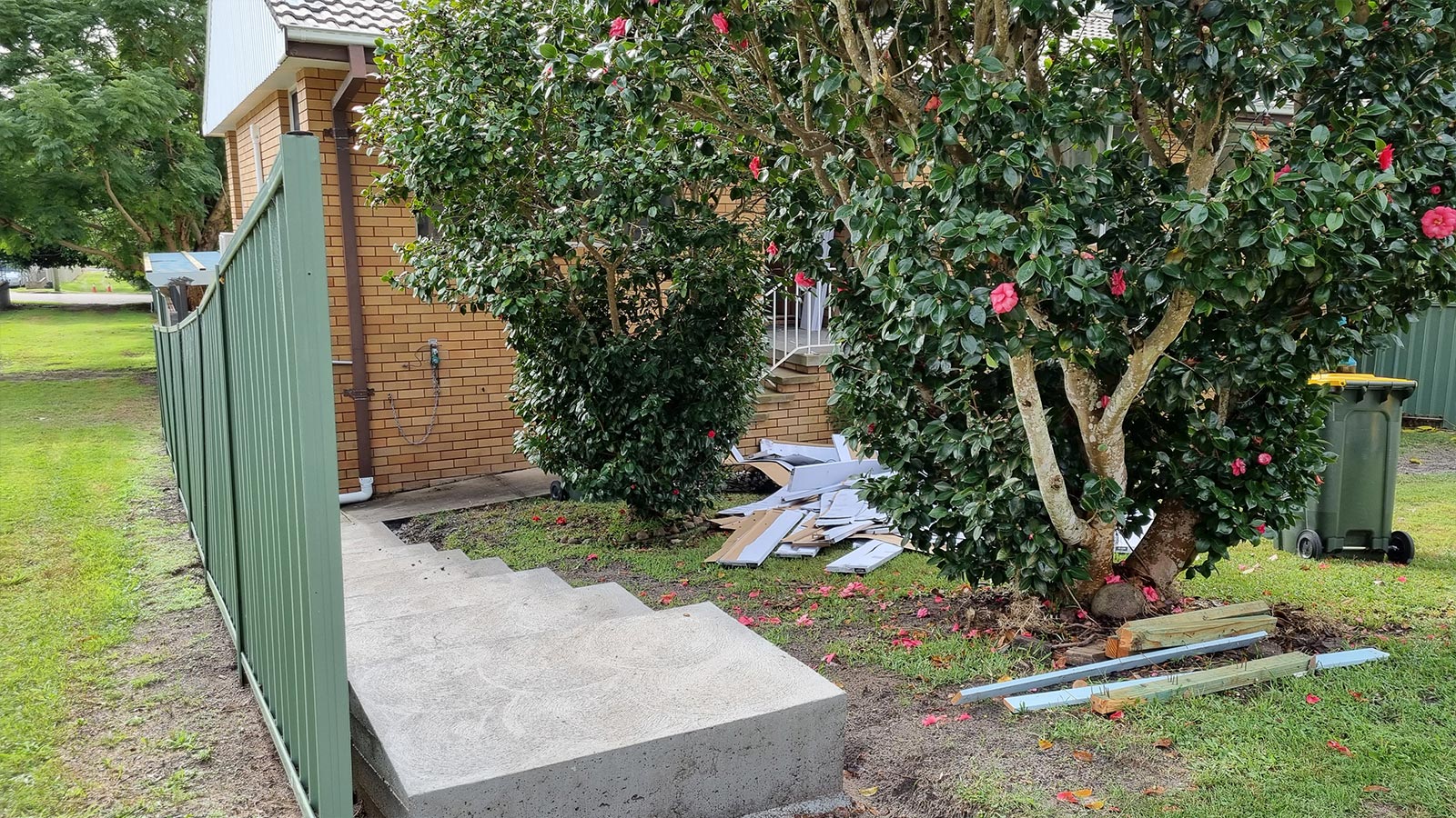 Nelson Bay side garden before the ground was levelled and the drainage and paving were installed