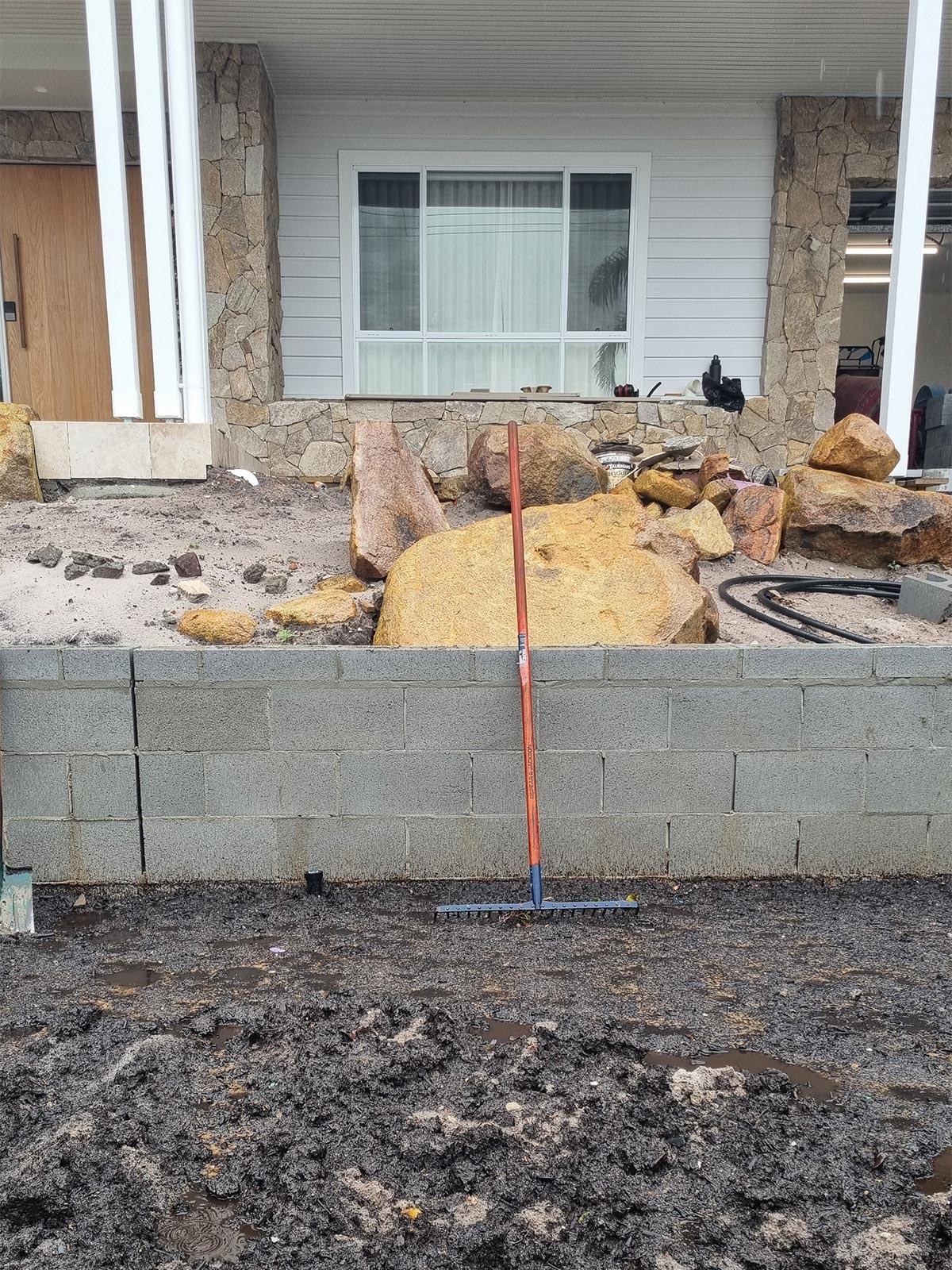 Shoal Bay front garden during construction before the coastal landscaping was completed